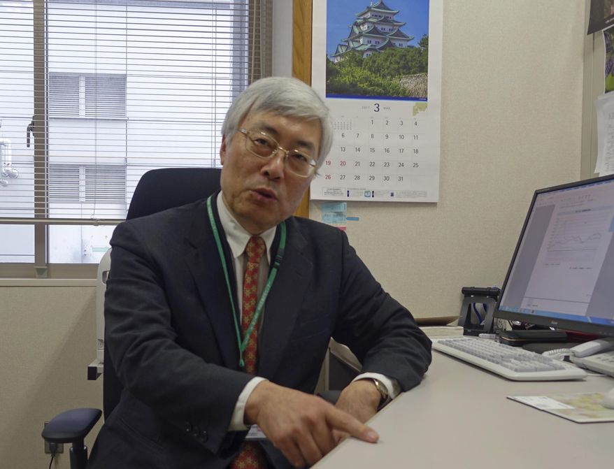 In this March 14, 2017 photo, Yutaka Motohashi, head of government-funded Japan Support Center for Suicide Countermeasures, speaks during an interview at his office in Kodaira, western suburb of Tokyo. Fewer Japanese are taking their own lives, a positive sign in a country with one of the world’s highest suicide rates. The still-high suicide rate means Japan is a difficult place to live, a society that is not kind to troubled people, said Motohashi. (AP Photo/Mari Yamaguchi)