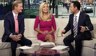 In this Feb. 29, 2016, file photo, co-hosts  Steve Doocy, from left, Ainsley Earhardt and Brian Kilmeade appear on the morning show &quot;Fox &amp; Friends&quot; in New York. During a phone interview on the Sept. 15, 2020, edition of the program, President Trump announced he would be appearing weekly on the program, something that seemed to be news to program co-host Steve Doocy. (AP Photo/Richard Drew, File)  ** FILE **