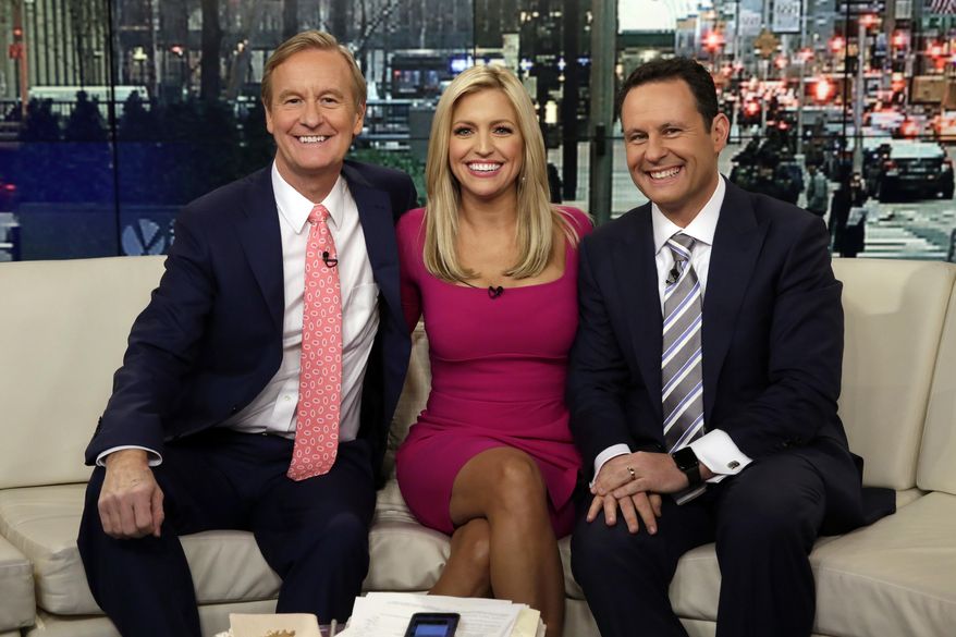FILE - In this Feb. 29, 2016 file photo, co-hosts  Steve Doocy, from left, Ainsley Earhardt and  Brian Kilmeade appear on the morning show &amp;quot;Fox &amp;amp; Friends&amp;quot; in New York. &amp;quot;Fox &amp;amp; Friends&amp;quot; has emerged as the morning television show of choice for President Donald Trump and his fans. Its average February 2017 audience of 1.72 million viewers was 49 percent over last year’s, the Nielsen company said.  (AP Photo/Richard Drew, File)