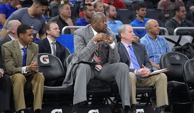 Former Hoya Patrick Ewing, 55, is currently an assistant coach with the NBA&#39;s Charlotte Hornets and could be the favorite to land the Georgetown job should he be interested. (Associated Press). ** FILE **