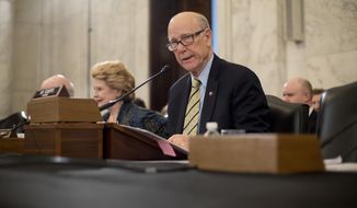 Senate Agriculture, Nutrition and Forestry Committee Chairman Sen. Pat Roberts, R-Kan. speaks on Capitol Hill in Washington, Thursday, March 23, 2017, prior to the start of the committee&#39;s confirmation hearing for Agriculture Secretary-designate Sonny Perdue. The committee&#39;s ranking member Sen. Debbie Stabenow, D-Mich. is at left. (AP Photo/Pablo Martinez Monsivais)