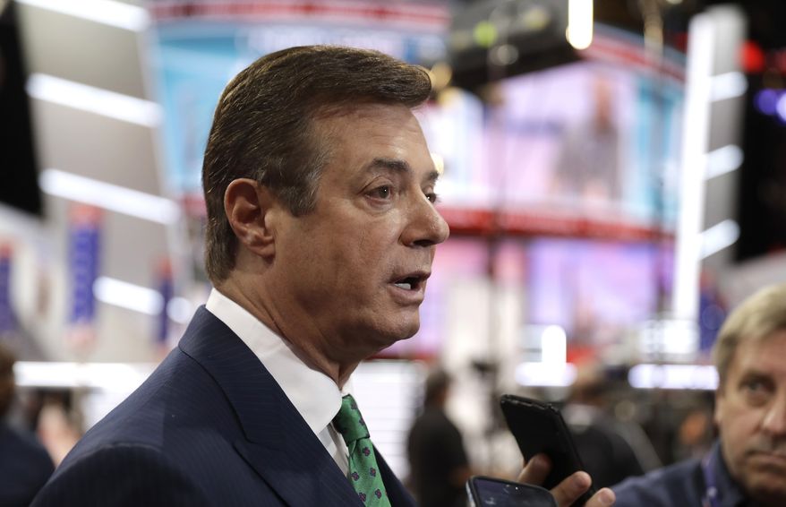 In this July 17, 2016, file photo, then-Trump campaign chairman Paul Manafort talks to reporters on the floor of the Republican National Convention in Cleveland. (AP Photo/Matt Rourke, File)