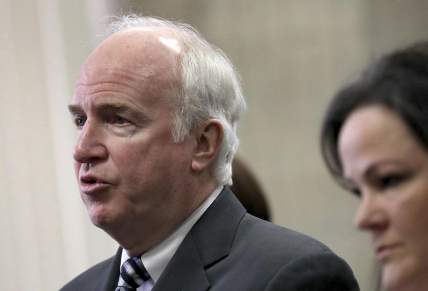 Mike Casey with the Chicago Police Board speaks in front of Judge Vincent Gaughan as former Chicago Police Officer Jason Van Dyke attends a hearing in front of the judge at the Leighton Criminal Courts Building Thursday, March 23, 2017 in Chicago. A grand jury has added 16 counts of aggravated battery with a firearm to the first-degree murder charges against Van Dyke, accused in the 2014 fatal shooting of a black 17-year-old. (Nancy Stone/Chicago Tribune via AP, Pool)