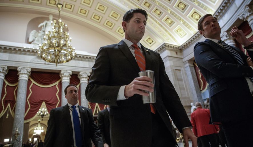 House Speaker Paul Ryan of Wis. walks to his office on Capitol Hill in Washington, Thursday, March 23, 2017, as he and the Republican leadership scramble for votes on their health care overhaul in the face of opposition from reluctant conservatives in the House Freedom Caucus. (AP Photo/J. Scott Applewhite)