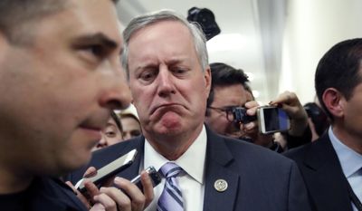House Freedom Caucus Chairman Rep. Mark Meadows, R-N.C. reacts to a reporters question on Capitol Hill in Washington, Thursday, March 23, 2017, following a Freedom Caucus meeting. GOP House leaders delayed their planned vote on a long-promised bill to repeal and replace &amp;quot;Obamacare,&amp;quot; in a stinging setback for House Speaker Paul Ryan and President Donald Trump in their first major legislative test.  (AP Photo/Alex Brandon)