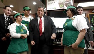 New Jersey Gov. Chris Christie, center, talks to employees of a QuickChek convenience store after a news conference talking about jobs, Thursday, March 23, 2017, in Cedar Knolls, N.J. New data shows New Jersey added 12,600 jobs last month and the unemployment rate fell to 4.4 percent from 4.6 percent. Bureau of Labor Statistics preliminary reports announced on Thursday show the state jobless rate has reached a 10-year low. (AP Photo/Julio Cortez)
