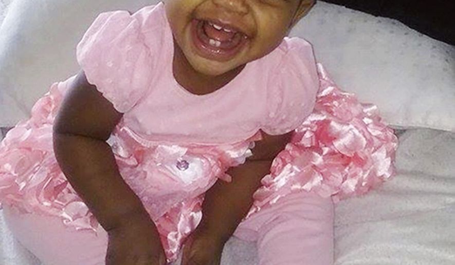This Jan. 30, 2016, photo provided by Helen Jackson shows Cataleya Tamekia-Damiah Wimberly before her 1st birthday party in Milwaukee. Wimberly died nearly three weeks later from a methadone overdose in a case the Milwaukee police are still investigating. The number of children's deaths is still small relative to the overall toll from opioids, but toddler fatalities have climbed steadily over the last 10 years. (Helen Jackson via AP)