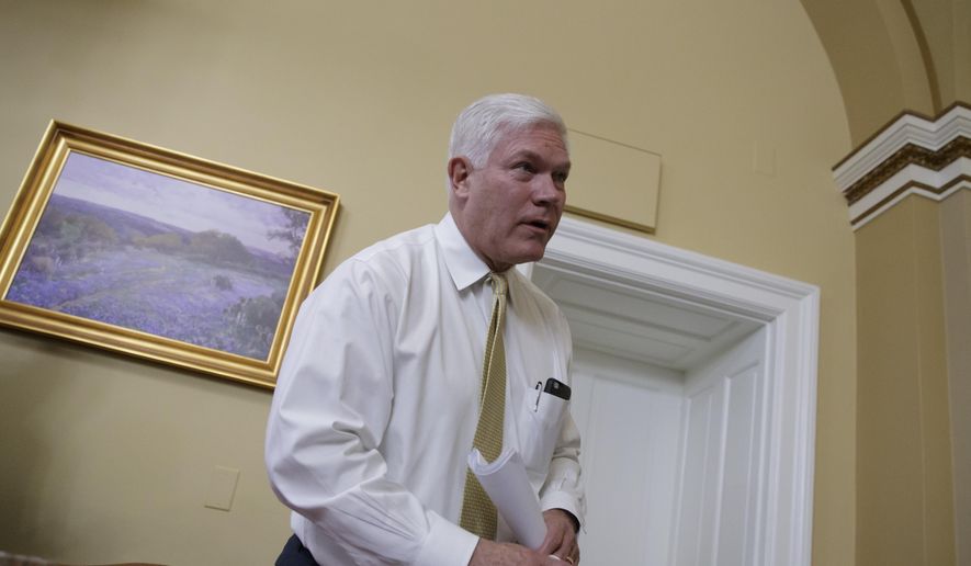 House Rules Committee Chairman Rep. Pete Sessions, R-Texas, finishes the final wording on the Republican health care bill before sending it to the floor for debate and a vote, Friday, March 24, 2017, on Capitol Hill in Washington. (AP Photo/J. Scott Applewhite) ** FILE **