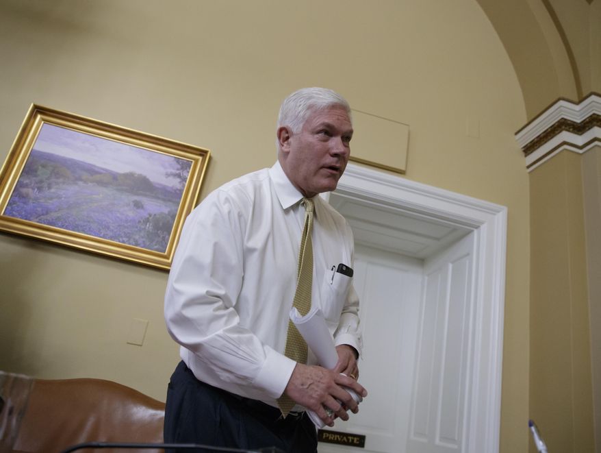 House Rules Committee Chairman Rep. Pete Sessions, R-Texas, finishes the final wording on the Republican health care bill before sending it to the floor for debate and a vote, Friday, March 24, 2017, on Capitol Hill in Washington. (AP Photo/J. Scott Applewhite) ** FILE **