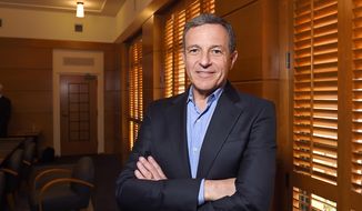Bog Iger, chairman and CEO of The Walt Disney Company, poses in a conference room in Burbank, California, Dec. 10, 2015. (AP Photo/Mark J. Terrill) ** FILE **