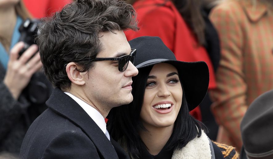 FILE - In this Jan. 21, 2013, file photo, John Mayer and Katy Perry arrive at the ceremonial swearing-in for President Barack Obama at the U.S. Capitol during the 57th Presidential Inauguration in Washington. Perry told The New York Times for an article published online March 23, 2017, that his new single, “Still Feel Like Your Man,” is about Perry. (AP Photo/J. Scott Applewhite, File)
