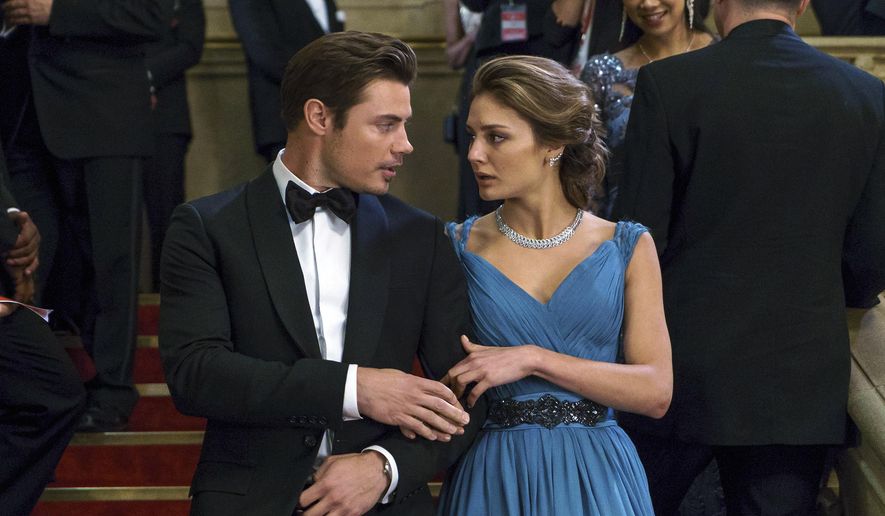 This image released by E! Entertainment shows Josh Henderson as Kyle West, left, and Christine Evangelista as Megan Morrison in a scene from, &amp;quot;The Arrangement.&amp;quot;  It airs Sunday nights at 10 p.m. (Daniel Power/E! Entertainment via AP)