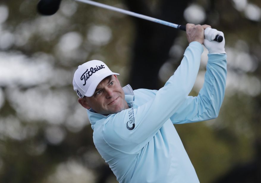 Bill Haas watches his tee shot on the first hole during the round of 16 play at the Dell Technologies Match Play golf tournament at Austin County Club, Saturday, March 25, 2017, in Austin, Texas. (AP Photo/Eric Gay)