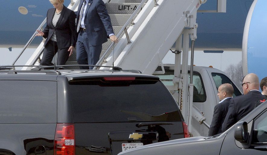 Vice President Mike Pence and Small Business Administrator Linda McMahon arrive at Yeager Airport in Charleston, W.Va., on Saturday, March 25, 2017 to travel by motorcade to Putnam County for a meeting with small business operators. (Chris Dorst/Charleston Gazette-Mail via AP)