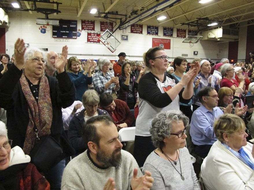 U.S. Senators Bernie Sanders and Patrick Leahy and Rep. Peter Welch hold a town hall meeting with constituents Saturday, March 25, 2017, in Hardwick, Vt. The three-member congressional delegation called the defeat of the Republican health care plan a victory.(AP Photo/ Lisa Rathke)