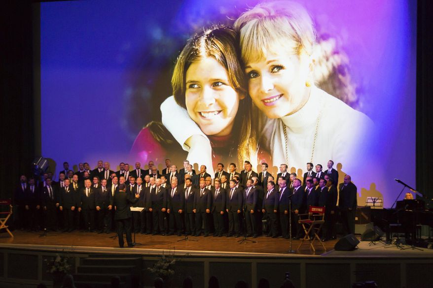 The Gay Men's Chorus of Los Angeles performs at the Carrie Fisher and Debbie Reynolds Memorial Service at The Forest Lawn on Saturday, March 25, 2017, in Los Angeles. (Photo by Willy Sanjuan/Invision/AP)
