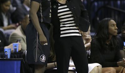 Florida State head coach Sue Semrau talks with guard Imani Wright during the first half against Oregon State in a regional semifinal of the women's NCAA college basketball tournament  Saturday, March 25, 2017, in Stockton, Calif. (AP Photo/Rich Pedroncelli)