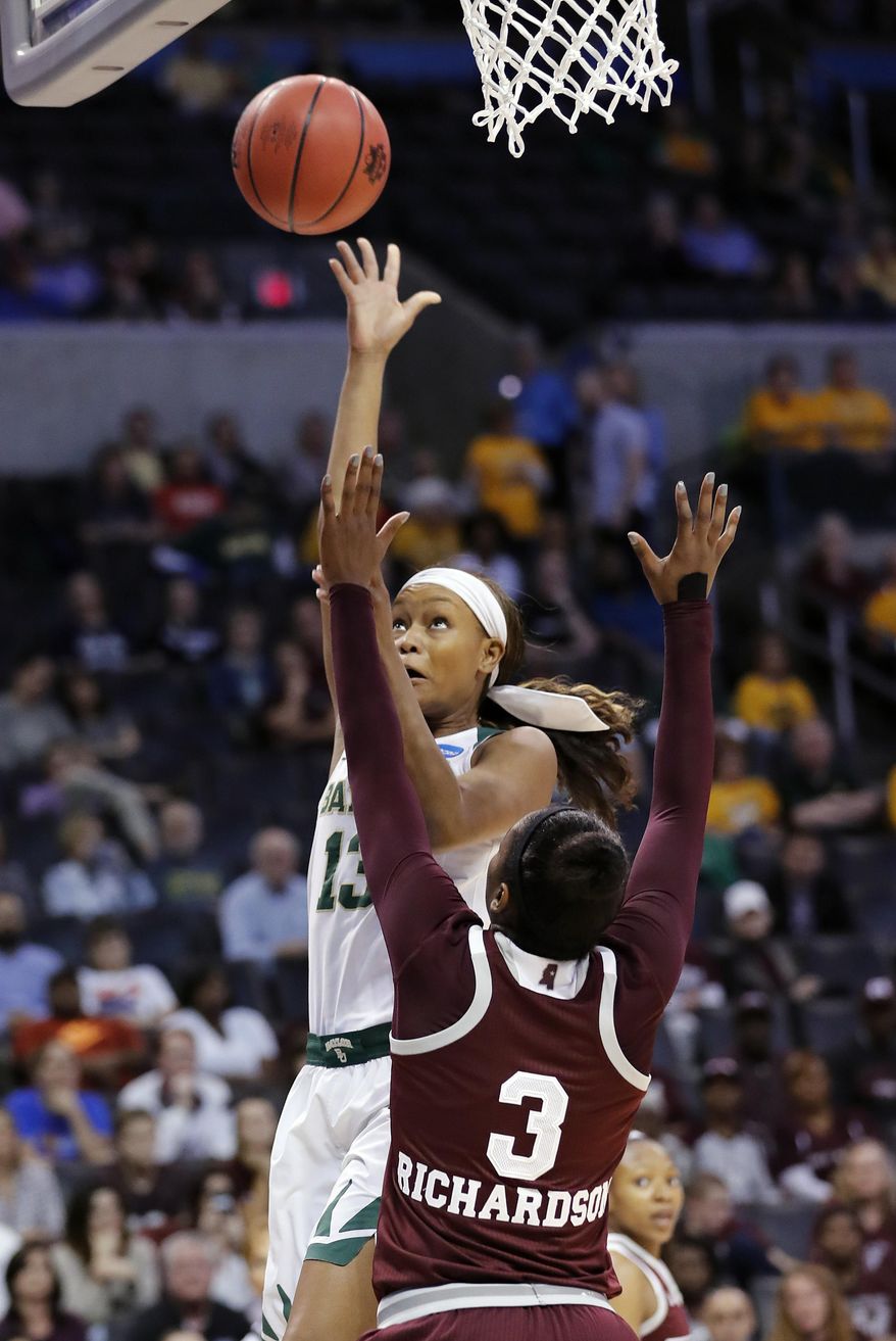 Baylor's Nina Davis (13) shoots over Mississippi State's Breanna Richardson (3) during the first half of a regional final of the NCAA women's college basketball tournament, Sunday, March 26, 2017, in Oklahoma City. (AP Photo/Alonzo Adams)