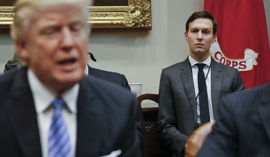 In this Monday, Jan. 23, 2017, file photo, White House Senior Adviser Jared Kushner, right, listens to President Donald Trump speak during a breakfast with business leaders in the Roosevelt Room of the White House in Washington. Trump is set to announce a new White House office run by his son-in-law, Kushner, that will seek to overhaul government functions using ideas from the business sector. (AP Photo/Pablo Martinez Monsivais, File)