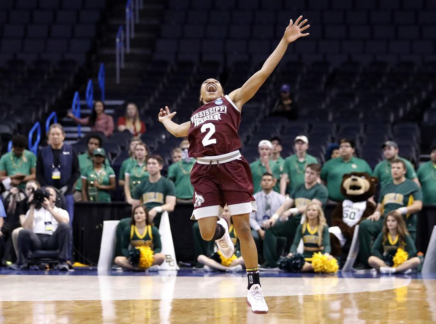 Mississippi State's Morgan William (2) celebrates at the conclusion of the regional final of the NCAA women's college basketball tournament against Baylor, Sunday, March 26, 2017, in Oklahoma City. Mississippi State won 94-85. (AP Photo/Alonzo Adams)