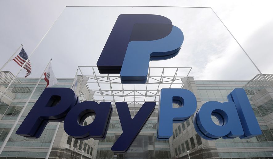Signage stands outside PayPal&#39;s headquarters in San Jose, California, March 10, 2015. (AP Photo/Jeff Chiu, File)