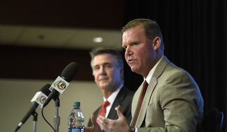 Scot McCloughan, right, speaks during an NFL football press conference where he was introduced as the Washington Redskins new general manager, Friday, Jan. 9, 2015, in Ashburn, Va. At left is Washington Redskins president Bruce Allen. (AP Photo/Nick Wass) **FILE**