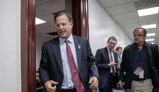 Rep. Dave Brat, R-Va., a member of the House Freedom Caucus whose conservative GOP members derailed the Republican health care bill last week, leaves a closed-door strategy session with Speaker of the House Paul D. Ryan, R-Wis., and the leadership as they try to rebuild unity within the Republican Conference, at the Capitol, in Washington, in this Tuesday, March 28, 2017, file photo. (AP Photo/J. Scott Applewhite) ** FILE **
