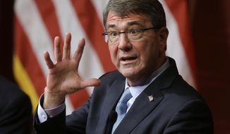 FILE - In this Dec. 1, 2015 file photo, Defense Secretary Ash Carter responds to a question during a forum at the John F. Kennedy School of Government at Harvard University in Cambridge, Mass. Harvard said Tuesday, March 28, 2017, that Carter is returning as a professor of technology and global affairs, and as director of Harvard&#39;s Belfer Center think tank. He previously taught at the Ivy League School from 1996 to 2009. (AP Photo/Steven Senne, File)
