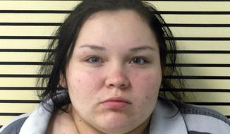 This photo provided by the Wagoner County Sheriff&#39;s Office shows Elizabeth Marie Rodriguez, of Oolagah, Okla. Police say Rodriguez, a woman suspected of driving three men to what Oklahoma authorities say was a home invasion in the Tulsa, Okla. suburb of Broken Arrow on Monday, March 27, 2017, that left the men shot to death by the homeowner&#39;s son, has been arrested on murder and burglary warrants. (Wagoner County Sheriff&#39;s Office via AP)