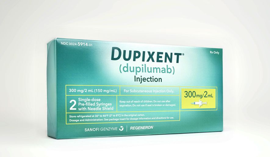 This image provided by Sanofi shows a box containing two single-dose pre-filled syringes of the drug Dupixent. On Tuesday, March 28, 2017, the Food and Drug Administration approved Dupixent for moderate or severe eczema, which causes red, fiercely itchy rashes on the face, arms and legs. (Rodrigo Cid/Sanofi via AP)