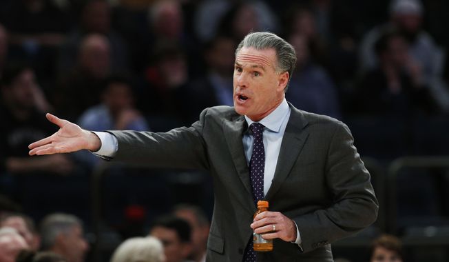 TCU head coach Jamie Dixon gestures against Central Florida during the first half of an NCAA college basketball game in the semifinals of the NIT Tuesday, March 28, 2017, in New York. (AP Photo/Kathy Willens)