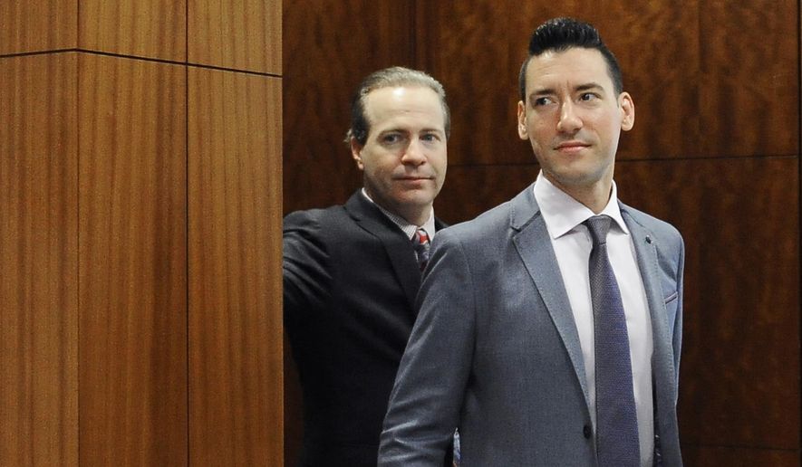 In this April 29, 2016, file photo, David Robert Daleiden, right, leaves a courtroom after a hearing in Houston. California prosecutors say two anti-abortion activists who made undercover videos of themselves trying to buy fetal tissue from Planned Parenthood have been charged with 15 felony counts of invasion of privacy. State Attorney General Xavier Becerra announced the charges Tuesday, March 28, 2017, against Daleiden and Sandra Merritt. (AP Photo/Pat Sullivan, File)