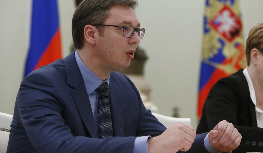 Serbian Prime Minister, Aleksandar Vucic, meets with Russian President Vladimir Putin during a meeting in Moscow, Russia, Monday, March 27, 2017. (Sergei Karpukhin/Pool photo via AP)