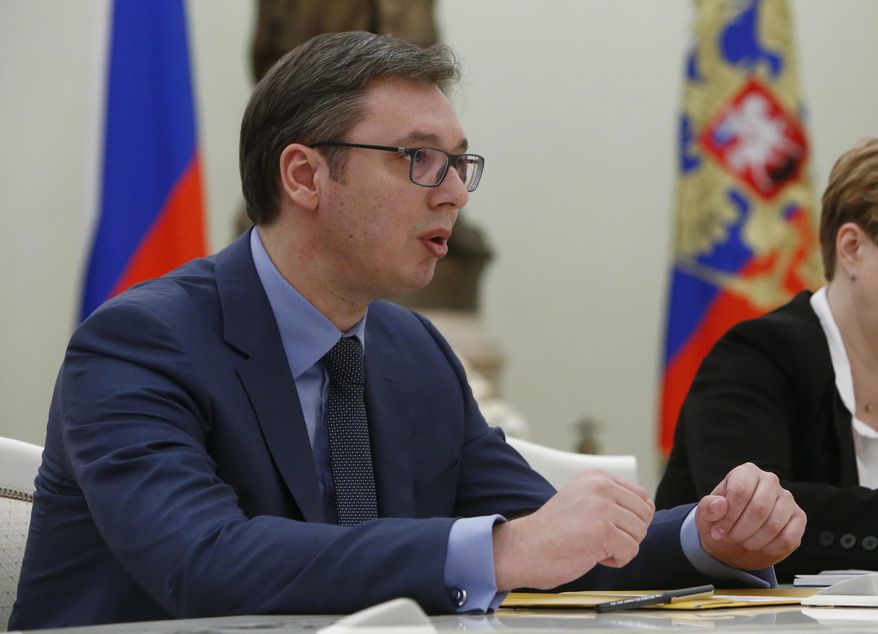 Serbian Prime Minister, Aleksandar Vucic, meets with Russian President Vladimir Putin during a meeting in Moscow, Russia, Monday, March 27, 2017. (Sergei Karpukhin/Pool photo via AP)