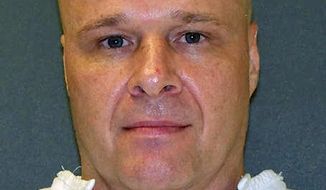 This undated photo provided by the Texas Department of Criminal Justice shows death row inmate Rick Rhoades. A federal appeals court is allowing Rhoades, an inmate on Texas death row for nearly 25 years for a double slaying in Houston, to move forward with an appeal. In the Houston case involving Rhoades, 52, the 5th U.S. Circuit Court of Appeals has agreed to consider whether his trial judge in 1992 was wrong during the sentencing phase to exclude from jurors childhood photos depicting Rhoades in normal happy activities to show he was nonviolent and would do well in a prison environment. The judge had ruled the photos were irrelevant.(Texas Department of Criminal Justice via AP)
