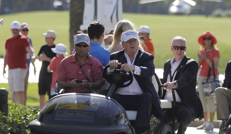 FILE- In this March 6, 2016 file photo, Donald Trump drives himself around the golf course to watch the final round of the Cadillac Championship golf tournament in Doral, Fla. President Donald Trump&#x27;s executive order seeking to rewrite a rule that protects small streams from pollution raises new questions about financial conflicts of interest for a president whose business holdings include a dozen U.S. golf courses. It&#x27;s not clear whether any financial benefits from more lax regulation of waterways on golf courses could violate laws meant to keep politicians from using public office for personal gain, but experts say it adds to an appearance of impropriety.(AP Photo/Luis Alvarez, File)