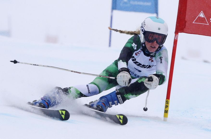 Foreste Peterson, of Berkeley, Calif., carves a turn on her first run at the women's giant slalom skiing race at the U.S. Alpine Ski Championships at Sugarloaf Mountain Resort in Carrabassett Valley, Maine, Monday, March 27, 2017. Peterson finished second. (AP Photo/Charles Krupa)