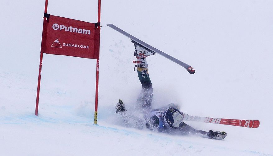 Paula Moltzan, of Lakeville, Minn., crashes on her second run at the women's giant slalom skiing race at the U.S. Alpine Ski Championships at Sugarloaf Mountain Resort in Carrabassett Valley, Maine, Monday, March 27, 2017. (AP Photo/Charles Krupa)