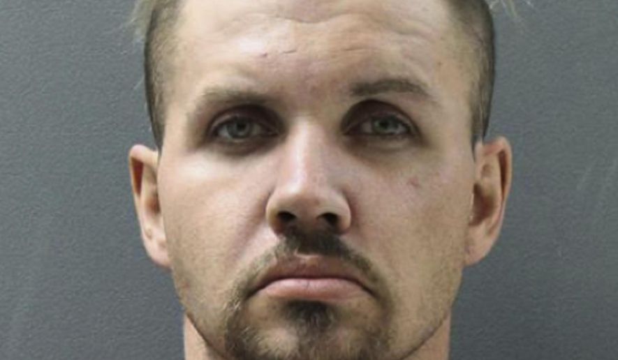 This Monday, March 27, 2017, photo provided by the Yavapai County Sheriff's Office shows John Freeman, 31, following his arrest Monday after a car chase in northern Arizona. A passenger who escaped from a stolen car pursued by a sheriff's deputy is not being prosecuted because he apparently merely hitched a ride with the driver, Freeman, and another man who both ended up in custody after a crash just off Interstate 40. (Yavapai County Sheriff's Office via AP)