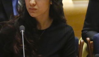 FILE - In this March 9, 2017 file photo, Nadia Murad,   a human rights activist and Yazidi genocide survivor, listens during a United Nations human rights meeting called &amp;quot;The Fight against Impunity for Atrocities: Bringing Da&#39;esh [ISIS] to Justice,&amp;quot;  at U.N. headquarters. Murad is working on a book. Tim Duggan Books, a Penguin Random House imprint, told The Associated Press on Wednesday, March 29, 2017,  that it had acquired “The Last Girl: My Story of Captivity, and My Fight Against the Islamic State.” Murad’s memoir is scheduled for Oct. 31. (AP Photo/Bebeto Matthews)