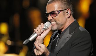  In this Sept. 9, 2012 file photo, British singer George Michael sings in concert to raise money for AIDS charity Sidaction, in Paris, France.  A private funeral took place Wednesday March 29, 2017, at Highgate Cemetery, north London, according to a statement released by Michael’s publicity agency, Connie Filippello Publicity, saying the funeral was attended by family and close friends. (AP Photo/Francois Mori, FILE) **FILE**