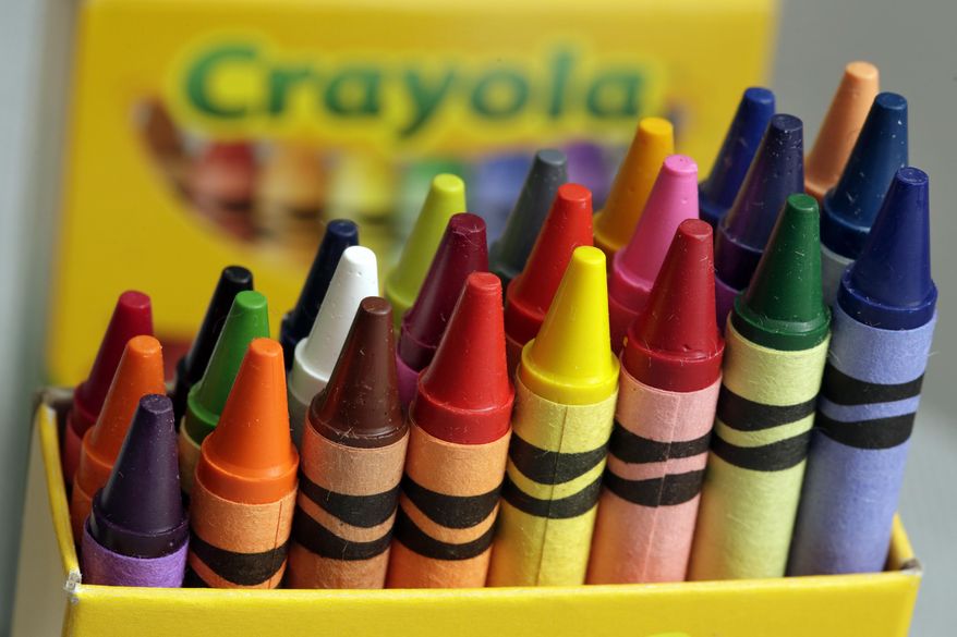 A 24-count box of Crayola crayons are shown, Tuesday, March 28, 2017, in New York. On National Crayon Day, Friday, March 31, Crayola is scheduled to announce the retirement of a color from the pack during an event in New York's Times Square. (AP Photo/Richard Drew)