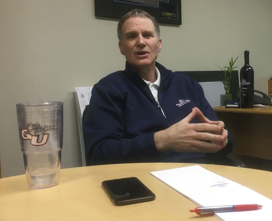 In this Tuesday, March 28, 2017 photo, Gonzaga University athletic director Mike Roth takes part in an interview in Spokane, Wash. Roth, co-architect of the team that is making its first appearance in the NCAA college basketball Final Four, says he is too nervous to watch the Bulldogs play from a seat, so he stands in the tunnels that lead to the court. (AP Photo/Nicholas K. Geranios)
