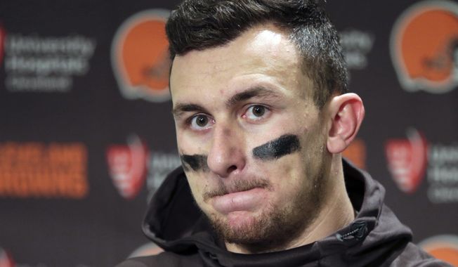 FILE - In this Dec. 20, 2015, file photo, Cleveland Browns quarterback Johnny Manziel speaks with media members following the team&#x27;s 30-13 loss to the Seattle Seahawks in an NFL football game in Seattle. New Orleans Saints coach Sean Payton shot down a report that his team had interest in troubled quarterback Johnny Manziel. They did meet during Super Bowl week, but Payton called the report the team was considering adding Manziel &amp;quot;false.&amp;quot; (AP Photo/Scott Eklund) ** FILE **
