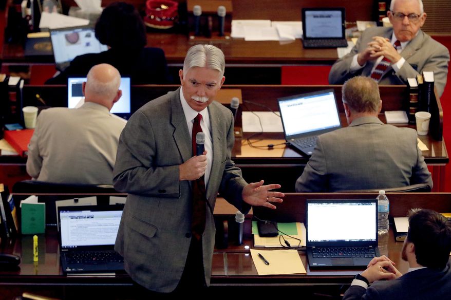 Rep. Jeff Collins speaks against HB 142 as it is debated on the House floor in the General Assembly in Raleigh, NC on Thursday, March 30, 2017. It is a bill to replace the controversial HB2. The bill passed the Senate, and then went to the House, where it also passed. (Chris Seward/The News & Observer via AP)