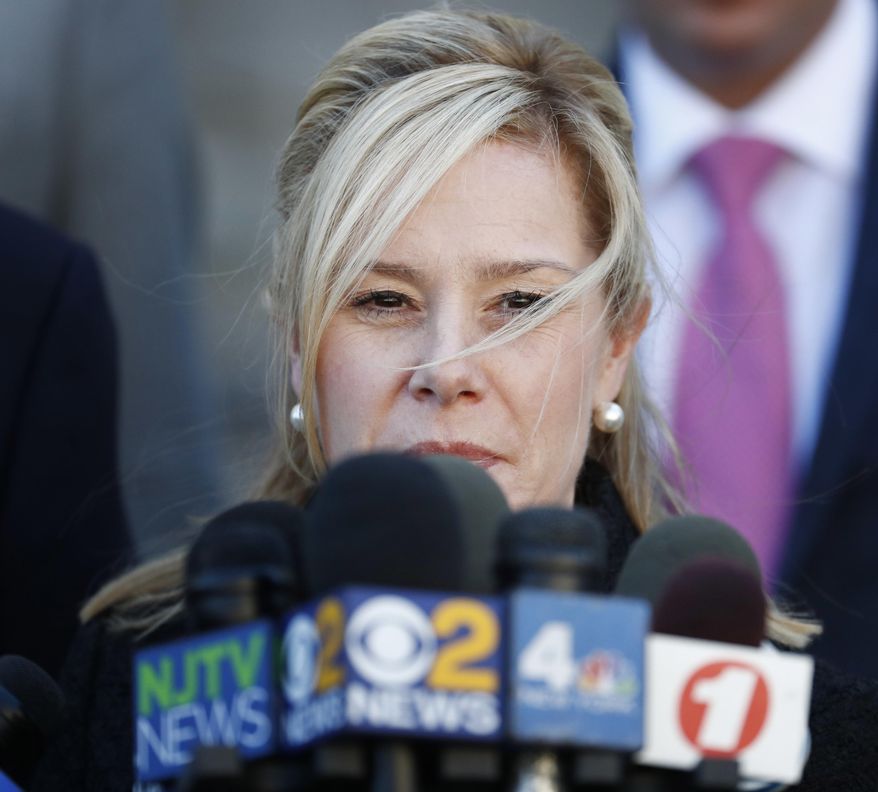 Bridget Kelly speaks to reporters after being sentenced in federal court in Newark, N.J., Wednesday, March 29, 2017. Kelly, 44, was sentenced to 18 months after she and Bill Baroni were convicted for their roles in the 2013 George Washington Bridge lane-closing scandal. Baroni, 45, was sentenced to two years. Both must also serve 500 hours of community service. (AP Photo/Seth Wenig)