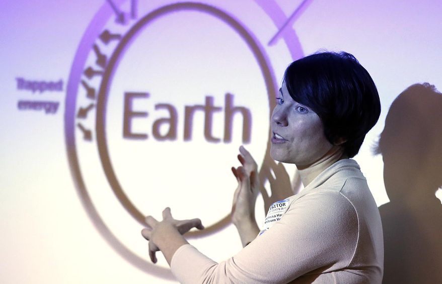 In this March 5, 2017 photo, visiting social scientist Melissa Haeffner speaks about global warming and her December trip to Antarctica, at O'Fallon Township High School Milburn campus in O'Fallon, Ill. Haeffner was one of 76 female scientists on the inaugural Homeward Bound expedition to Antarctica, where the women learned leadership skills and how to improve communication among their various fields. Organizers chose Antarctica because of the continent's importance in measuring climate change (Steve Nagy /Belleville News-Democrat, via AP)