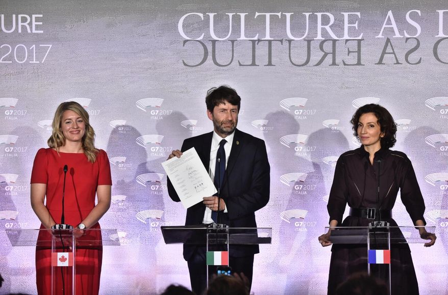 Canada's Culture Minister Melanie Joly, left, Italian Culture Minister Dario Franceschini, center, and French Culture Minister Audrey Azoulay, meet the media during a first-ever G7 Culture ministers meeting in Florence, Italy, March 30, 2017.  (Maurizio Degl' Innocenti/ANSA via AP)