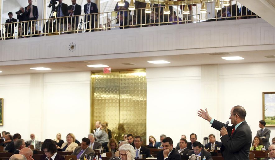 Rep. Michael Speciale, R- Craven, debates on the floor of the the North Carolina State House prior to a vote on HB 142 on Thursday, March 30, 2017, in Raleigh, N.C. North Carolina lawmakers voted Thursday to roll back North Carolina's "bathroom bill" in a bid to end the backlash over transgender rights that has cost the state dearly in business projects, conventions and basketball tournaments.(AP Photo/Brian Blanco)