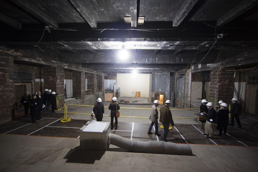 People tour the future location of a new forum after a groundbreaking ceremony for planned renovations of the Philadelphia Museum of Art in Philadelphia, Thursday, March 30, 2017. (AP Photo/Matt Rourke)